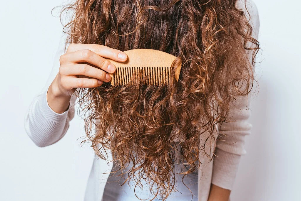 Parting curly hair